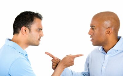 two men pointing at each other